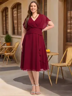 A-Line/Princess V-Neck Short Sleeves Knee-Length Plus Size Bridesmaid Dresses with Ruffles — view 1