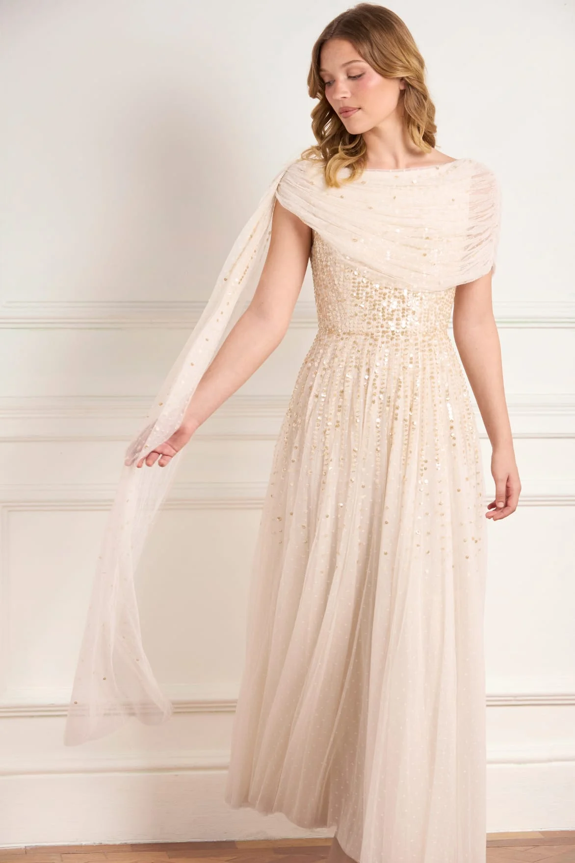 Cover image for Mother of the bride dresses with sleeves — how to choose flattering coverage